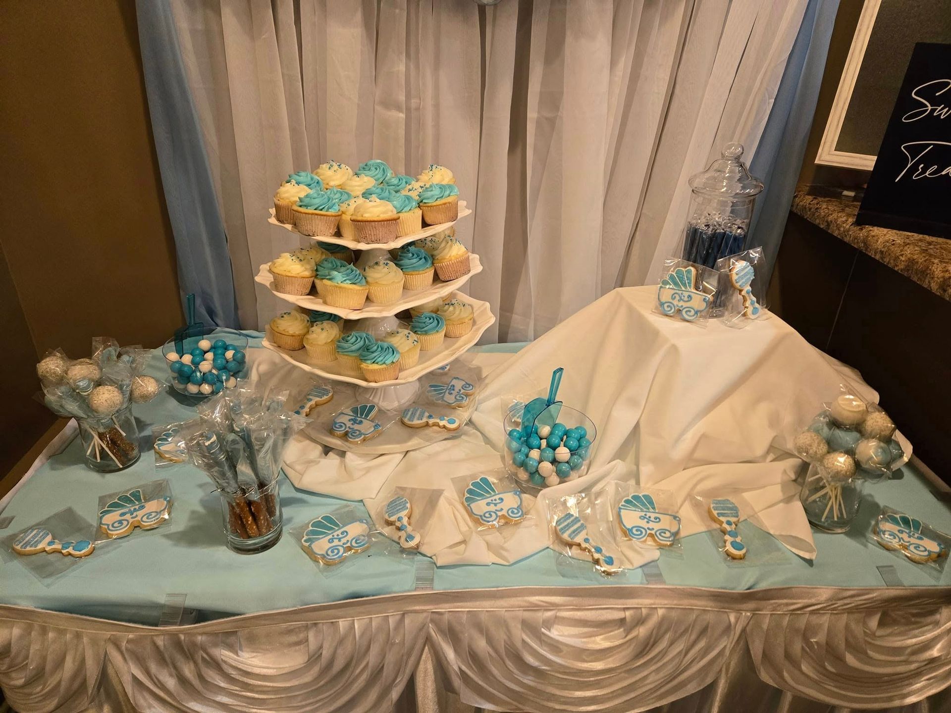 Elegant dessert table with cupcakes turquoise and gold